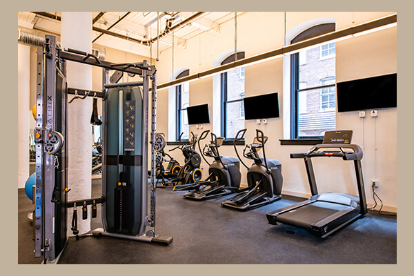Exercise room with treadmills and weight equipment