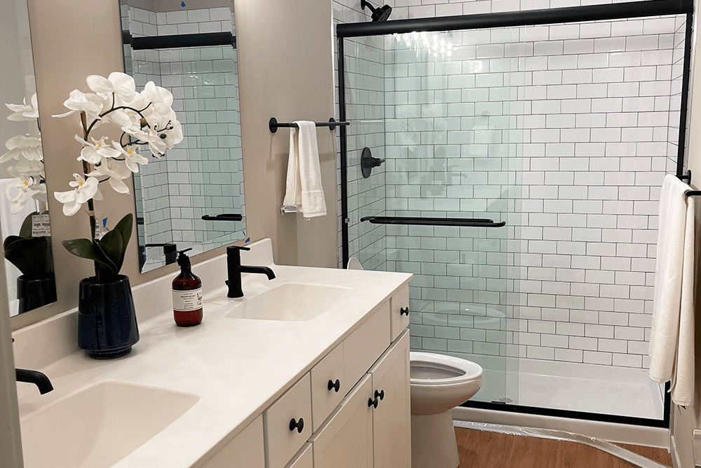 Bathroom vanity and shower in American Electric Loft apartments in St. Joe, MO