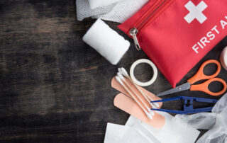 A first aid kit featuring a variety of medical supplies