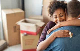 A young couple move in to their new downtown loft apartment