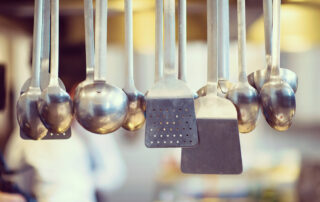 Kitchen utensils hanging in a modern kitchen