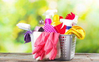 A basket of cleaning supplies perfect for spring cleaning