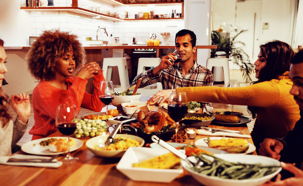 Residents of the St. Joseph apartments enjoy Thanksgiving dinner together