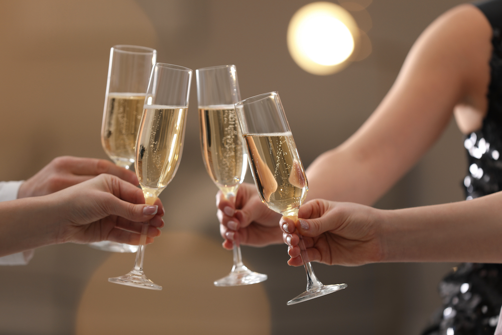 Friends give a NYE toast at the apartments in St. Joe , MO