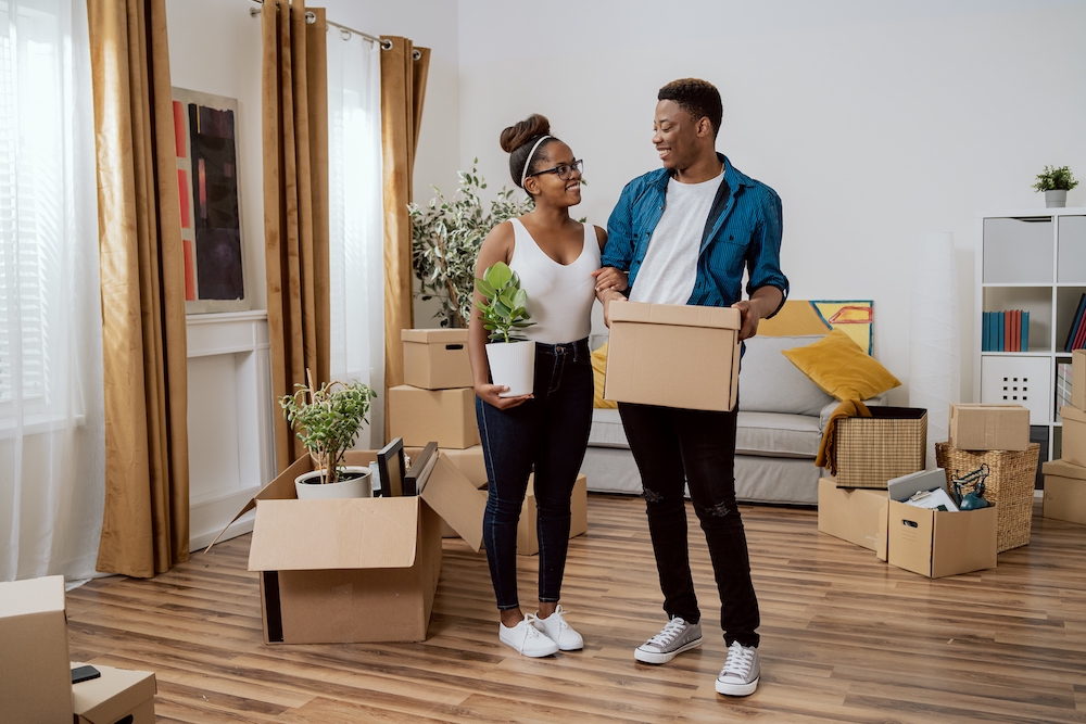 A young couple getting ready to move into the downtown apartments for rent