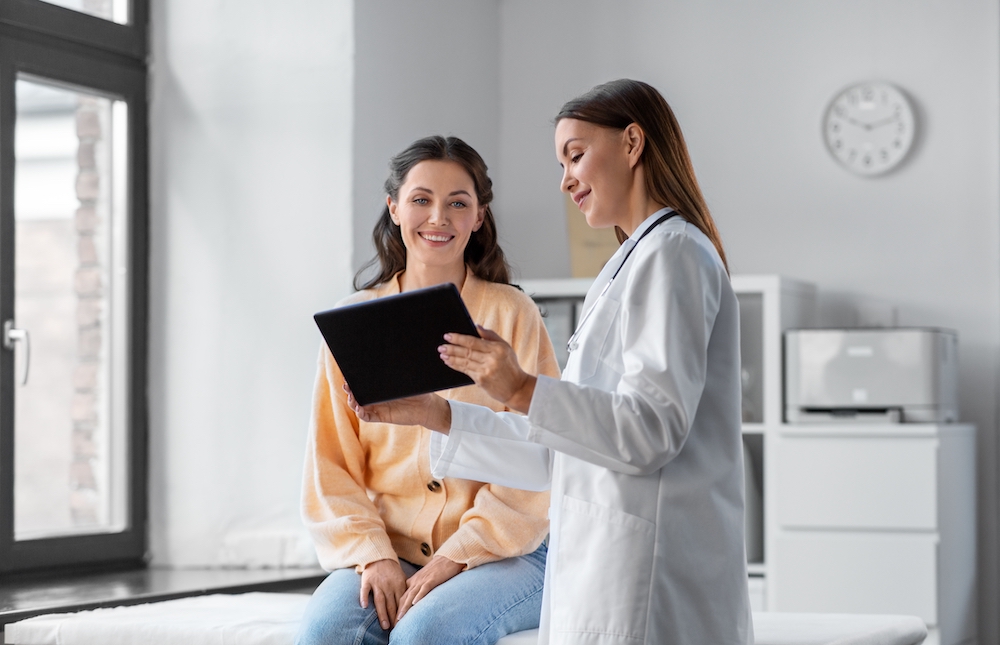 A young woman visits a doctor for her health check up