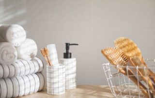Bathroom essentials organized on vanity cabinet