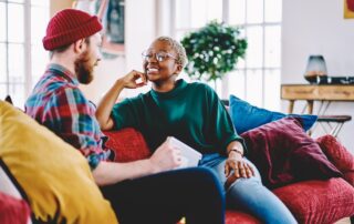 Young adult friends hang out and relax at the St. Joseph apartments